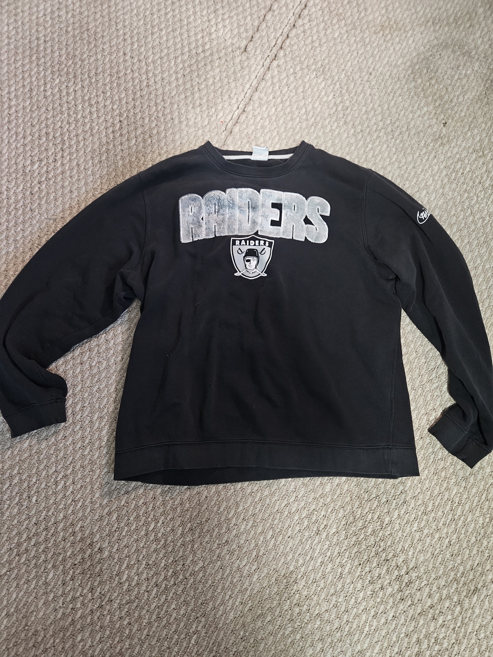 Nike Black Crewneck Sweatshirt with Silver Raiders Lettering